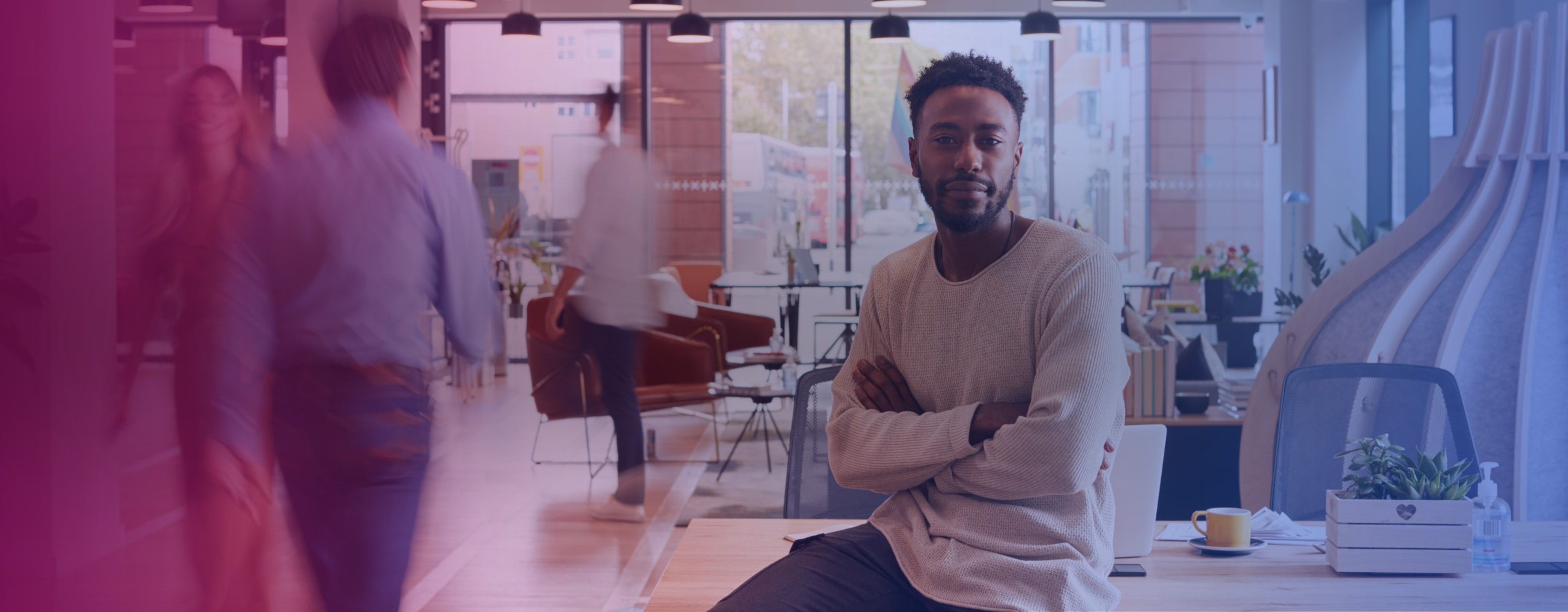 Office stock image with an employee smiling at the camera