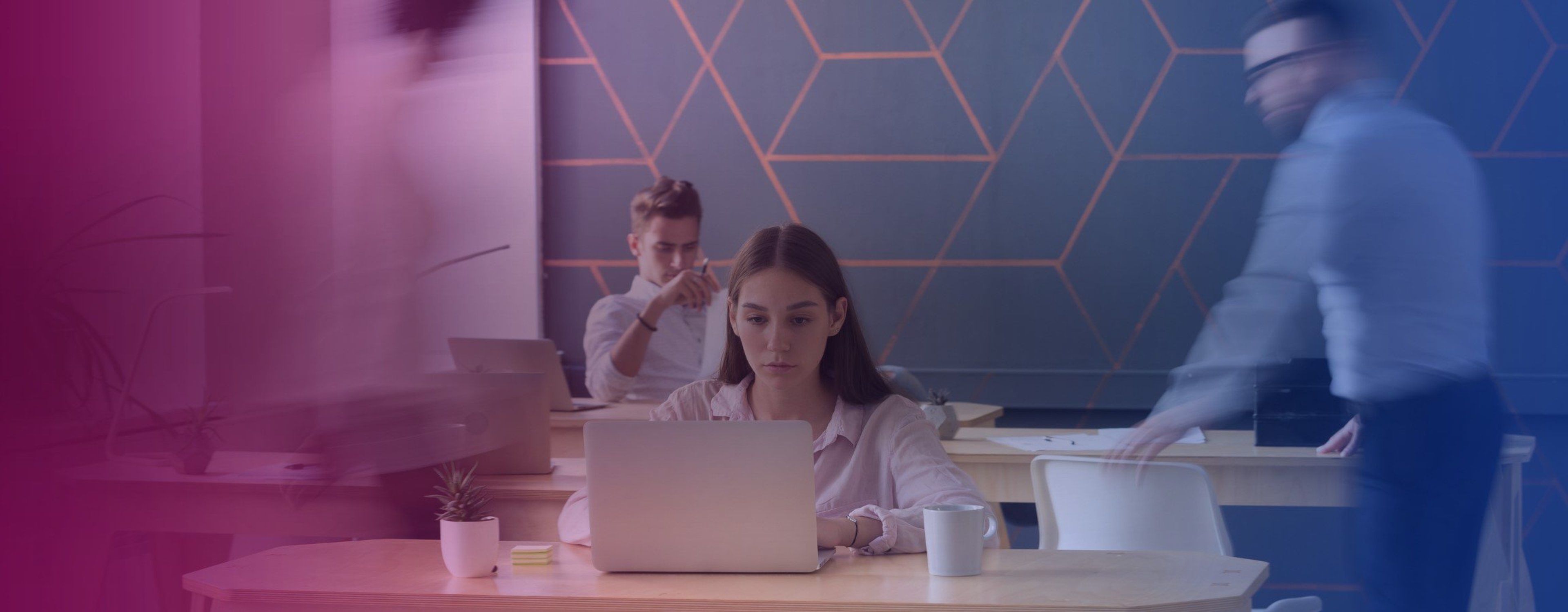 A stock image of a person working at their desk