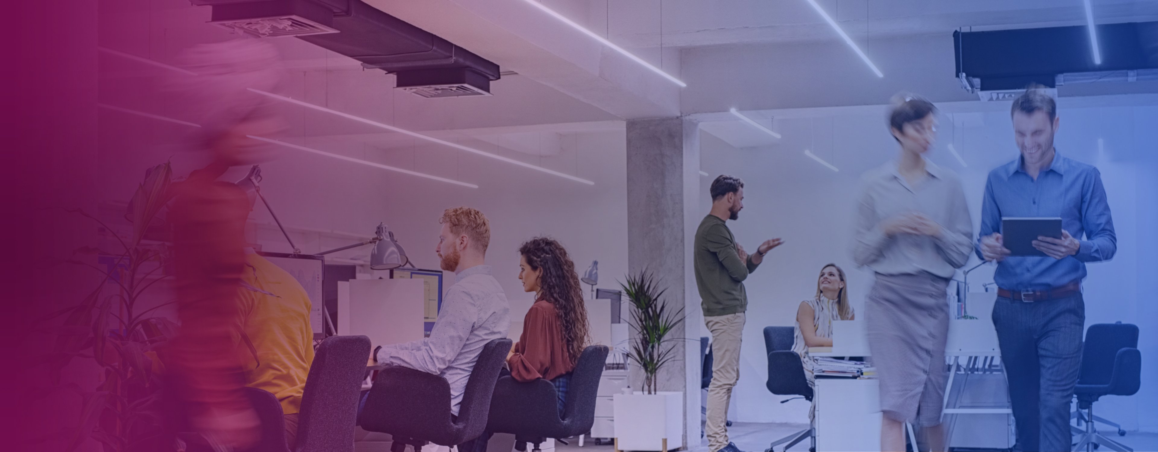 A stock image of people working in an office