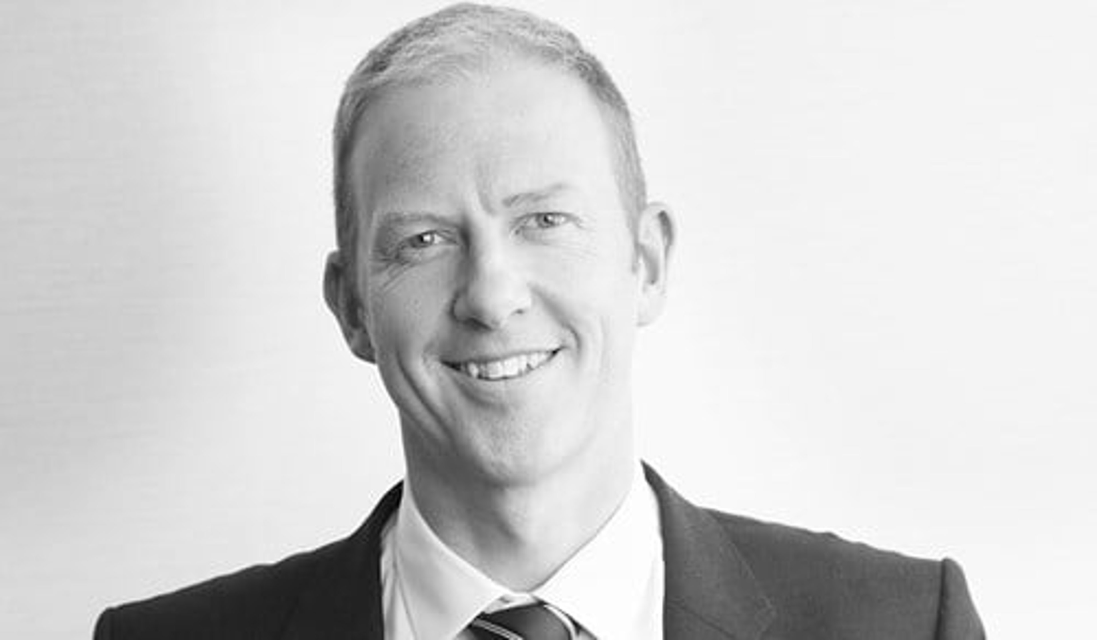 A headshot of Graham Dotchin