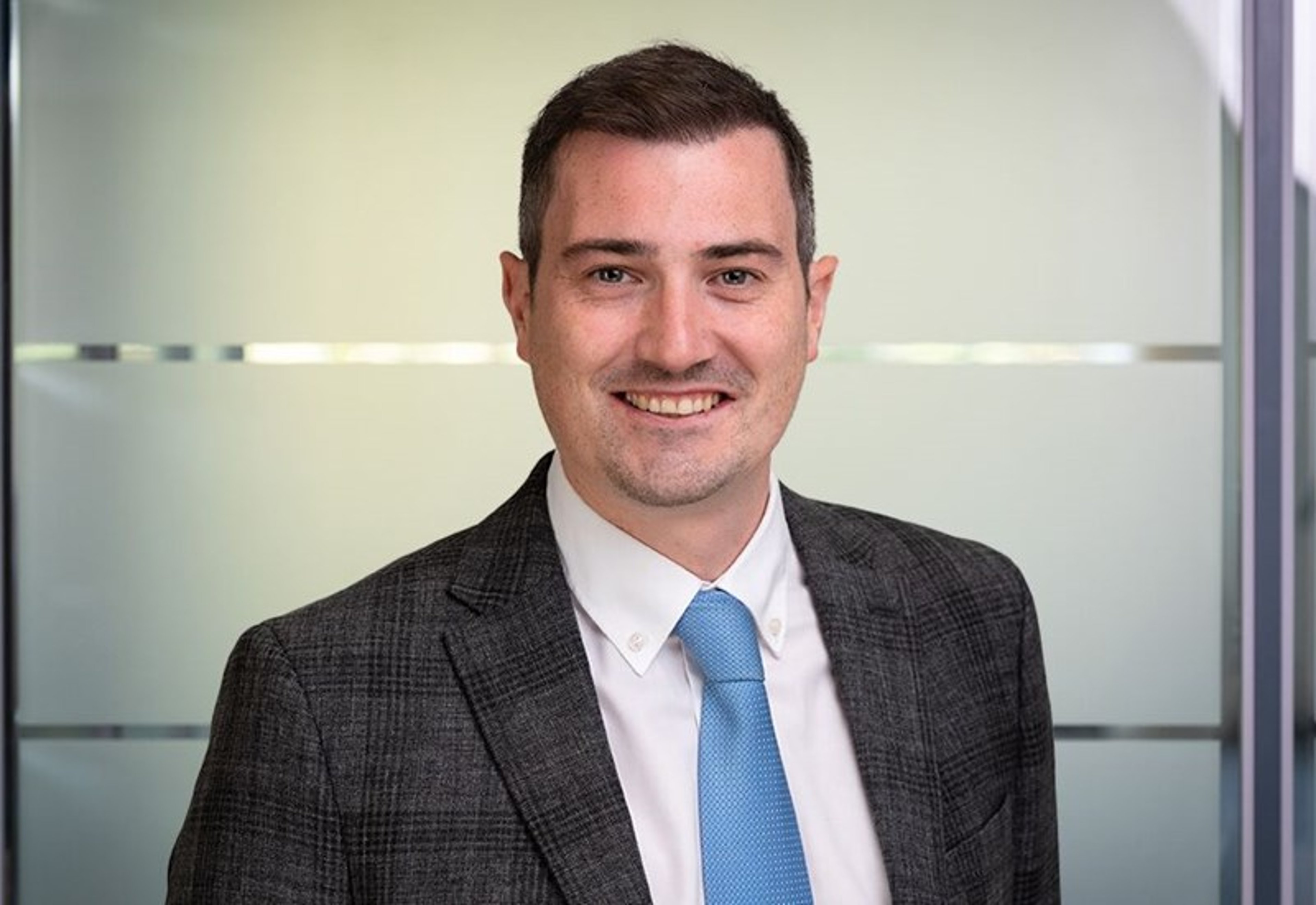 A headshot of Frazer Nicol