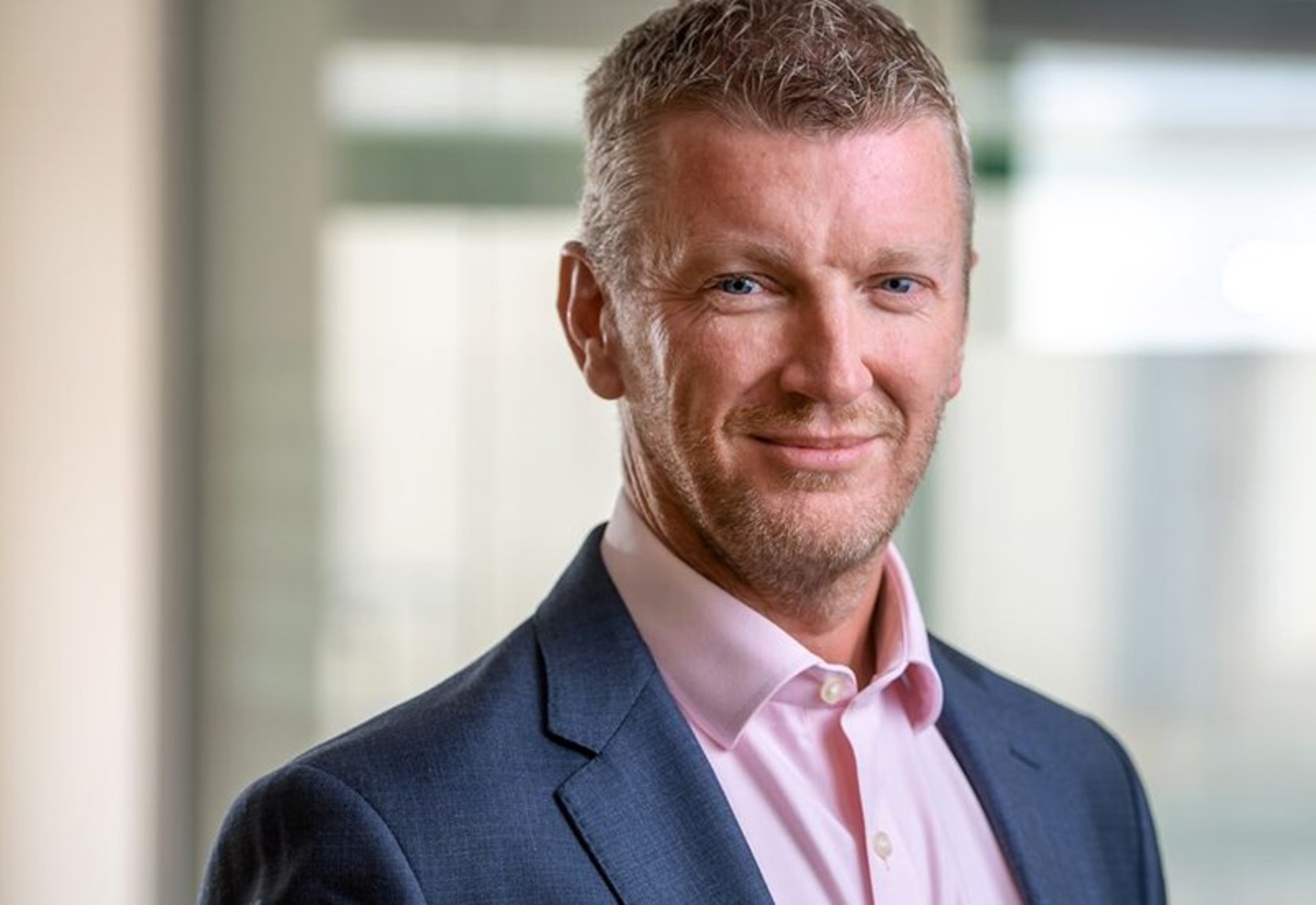 A headshot of James Leigh