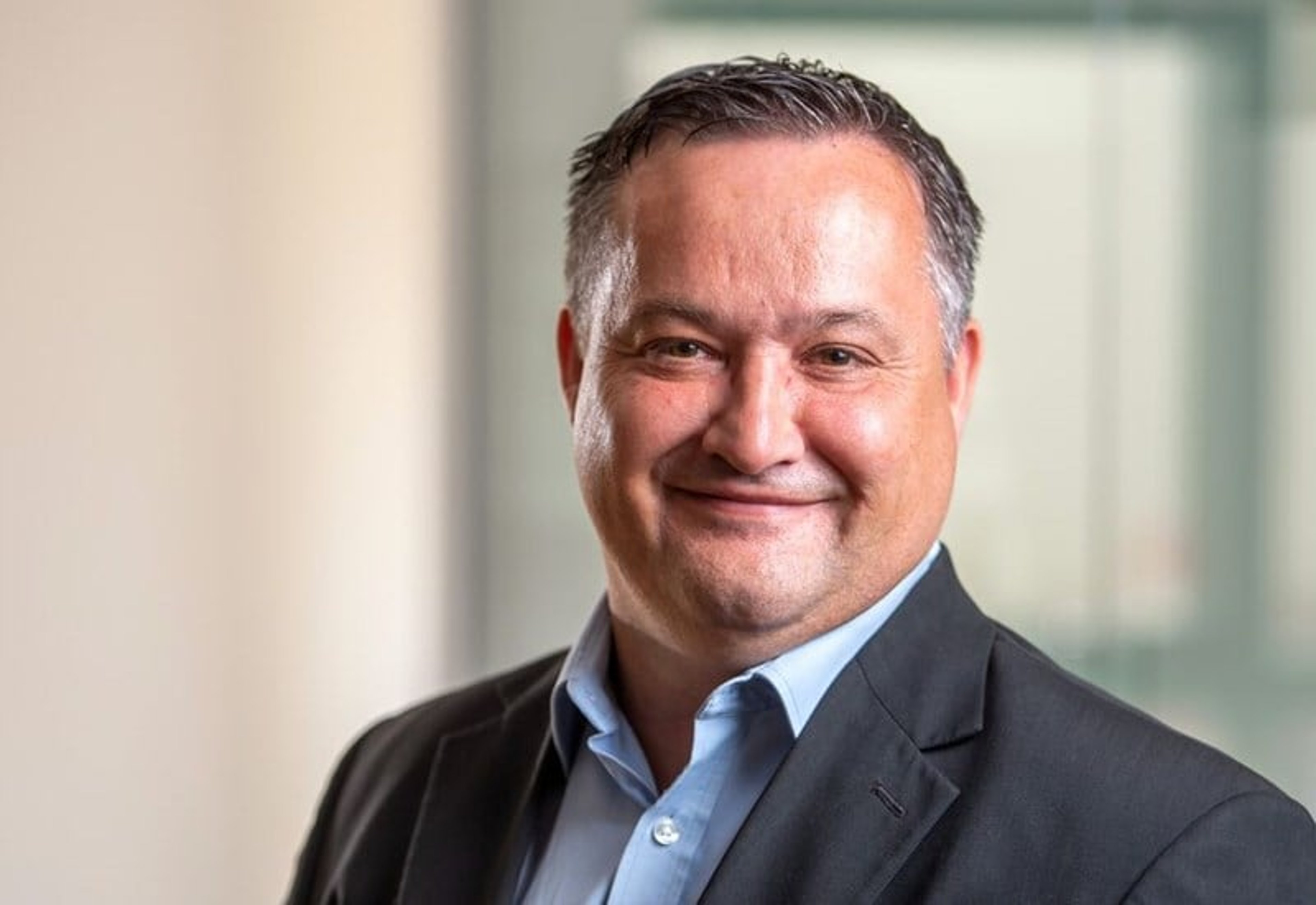 A headshot of Justin Bond
