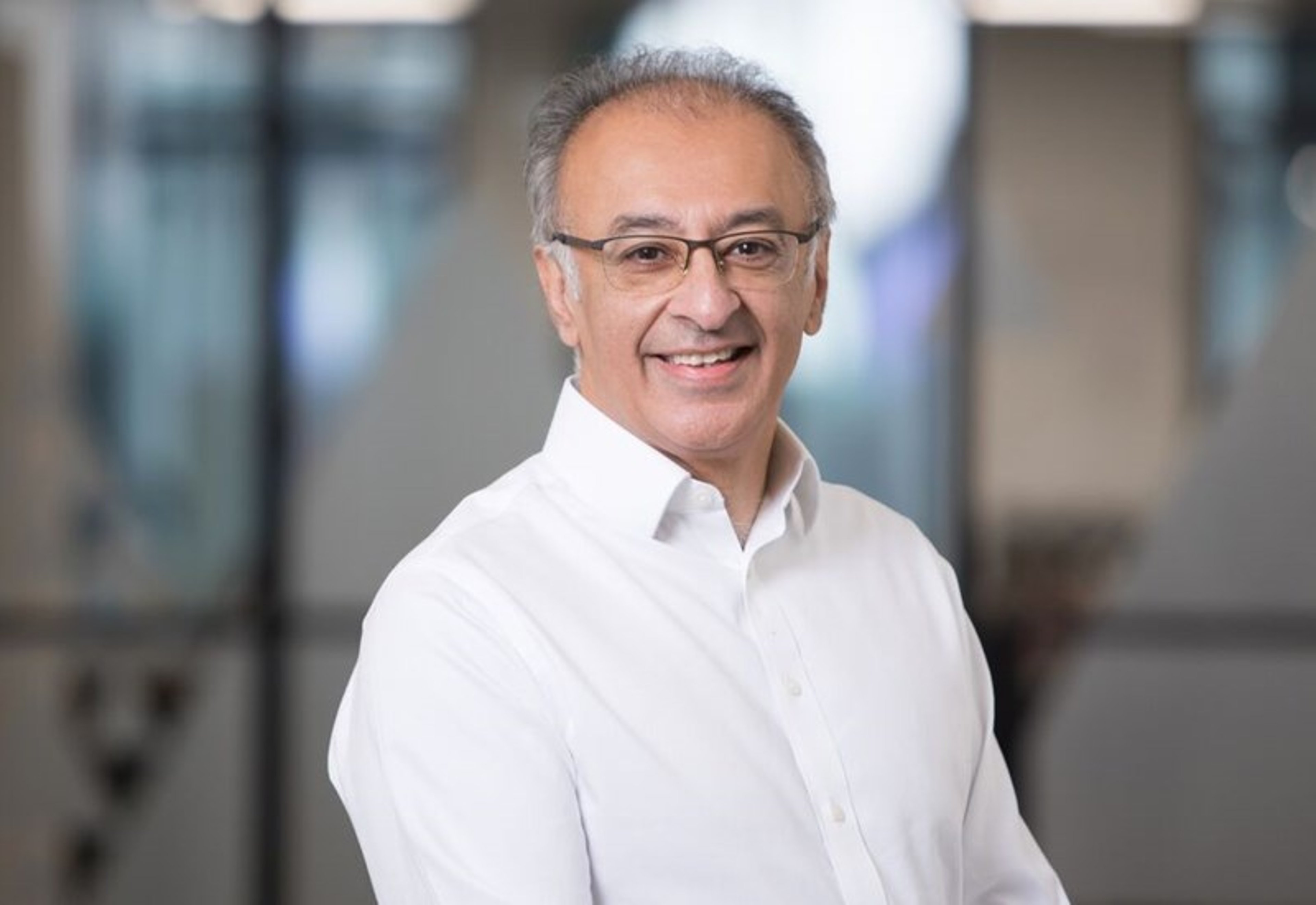 A headshot of Vasim Haq