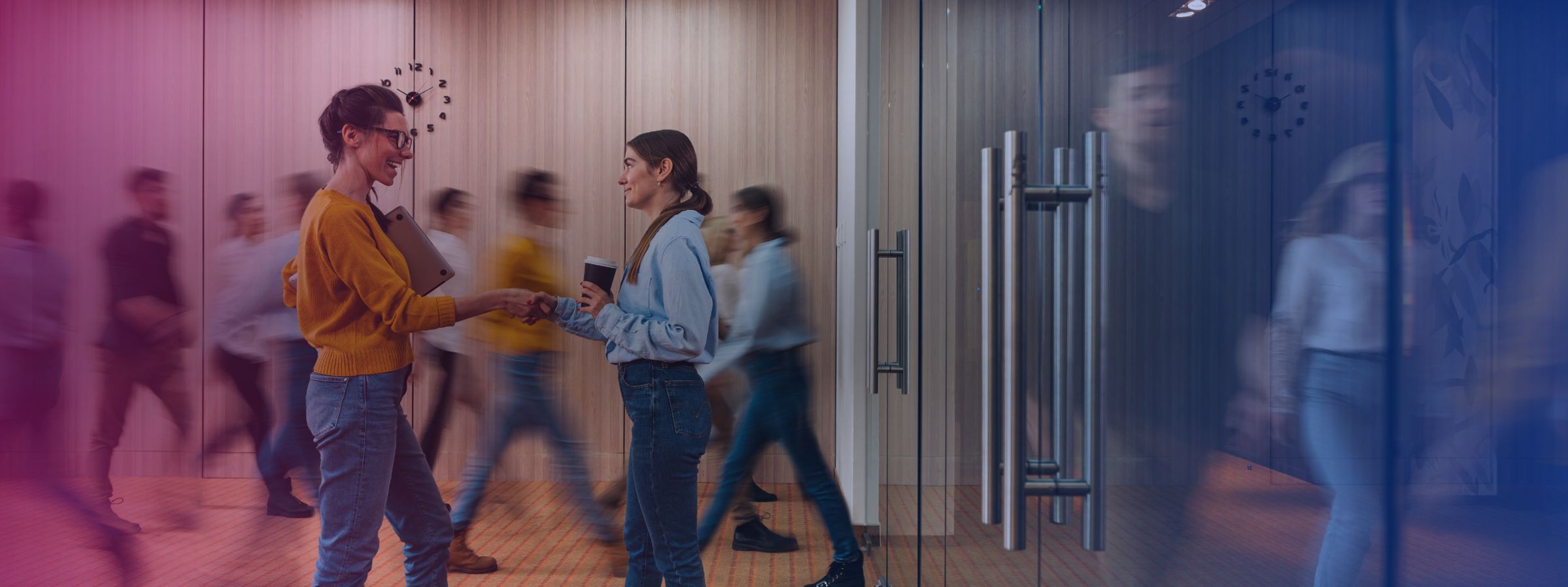 women_shaking_hands